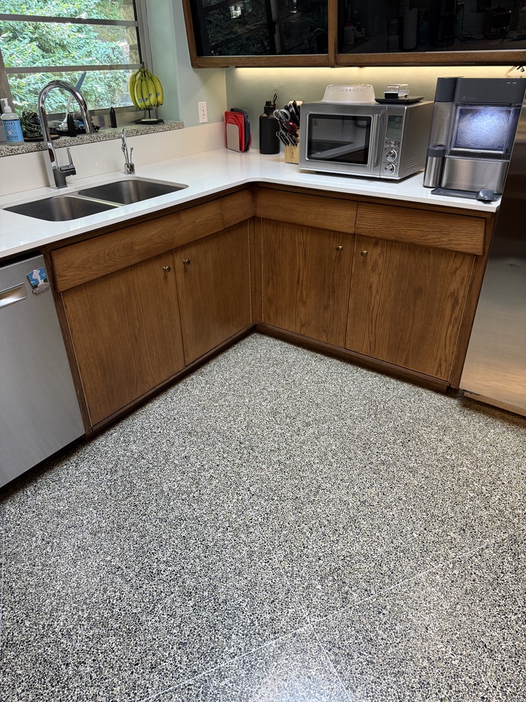 Breeds kitchen refreshed sink and corner cabinets